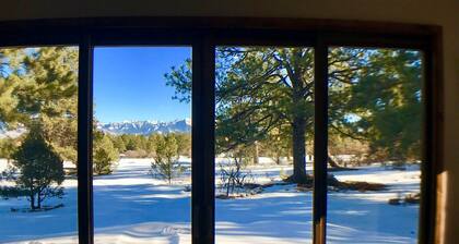 Villa de golf contemporánea con respaldo al campo de golf Divide Ranch, vistas panorámicas de Mtn