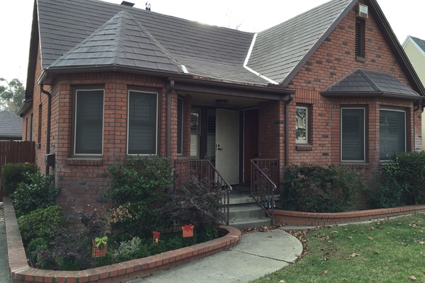 Our House. The Guest House is accessed from the side gate.
