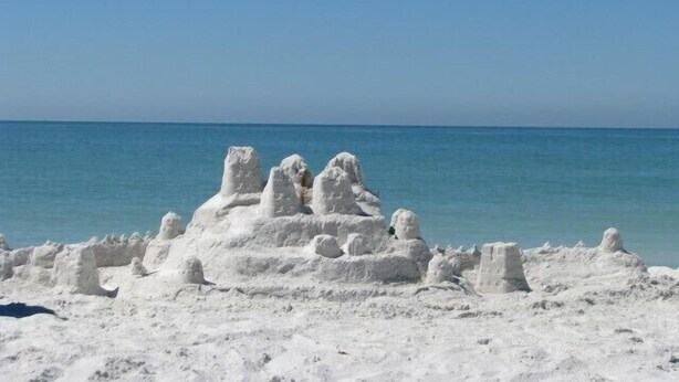 A sandy beach with white sand sculptures. - 10/10 EXCEPTIONAL!!! -161 REVIEWS-ANNA MARIA ISLAND-2B/2B-RENOVATED-WELL STOCKED (Bradenton Beach)