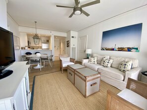 Smart TV, mesa de ping pong, libros