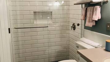 Shower, hair dryer, towels, soap