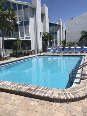 Outdoor pool, a heated pool - Beautiful Condo at Madeira Beach, 2Htd Pools,Walk to Beach,WiFi,Piers,Johns Pass (Madeira Beach)