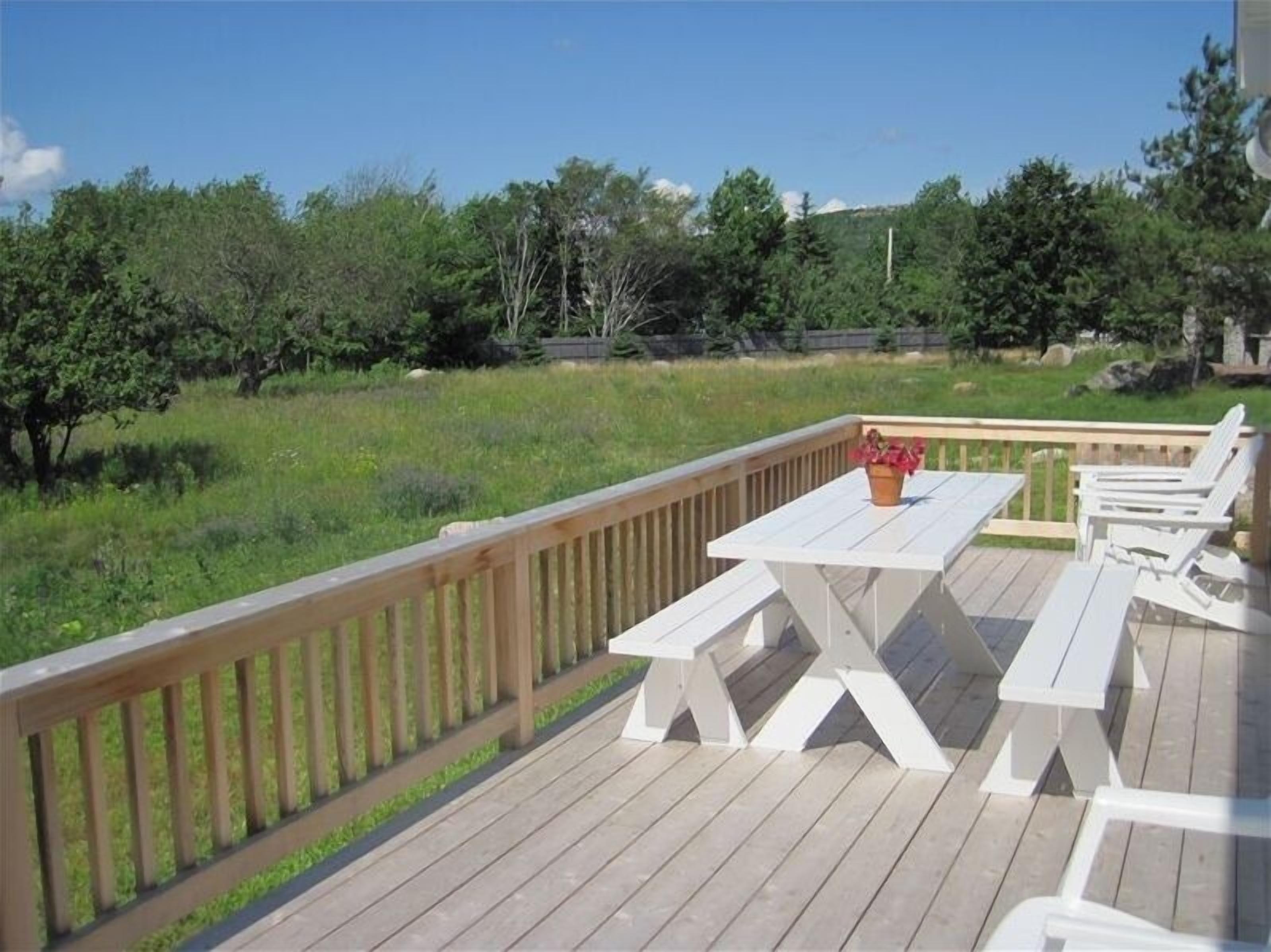 relax on the deck while taking in views of Cadillac Dorr Gorham & Champlain Mnts