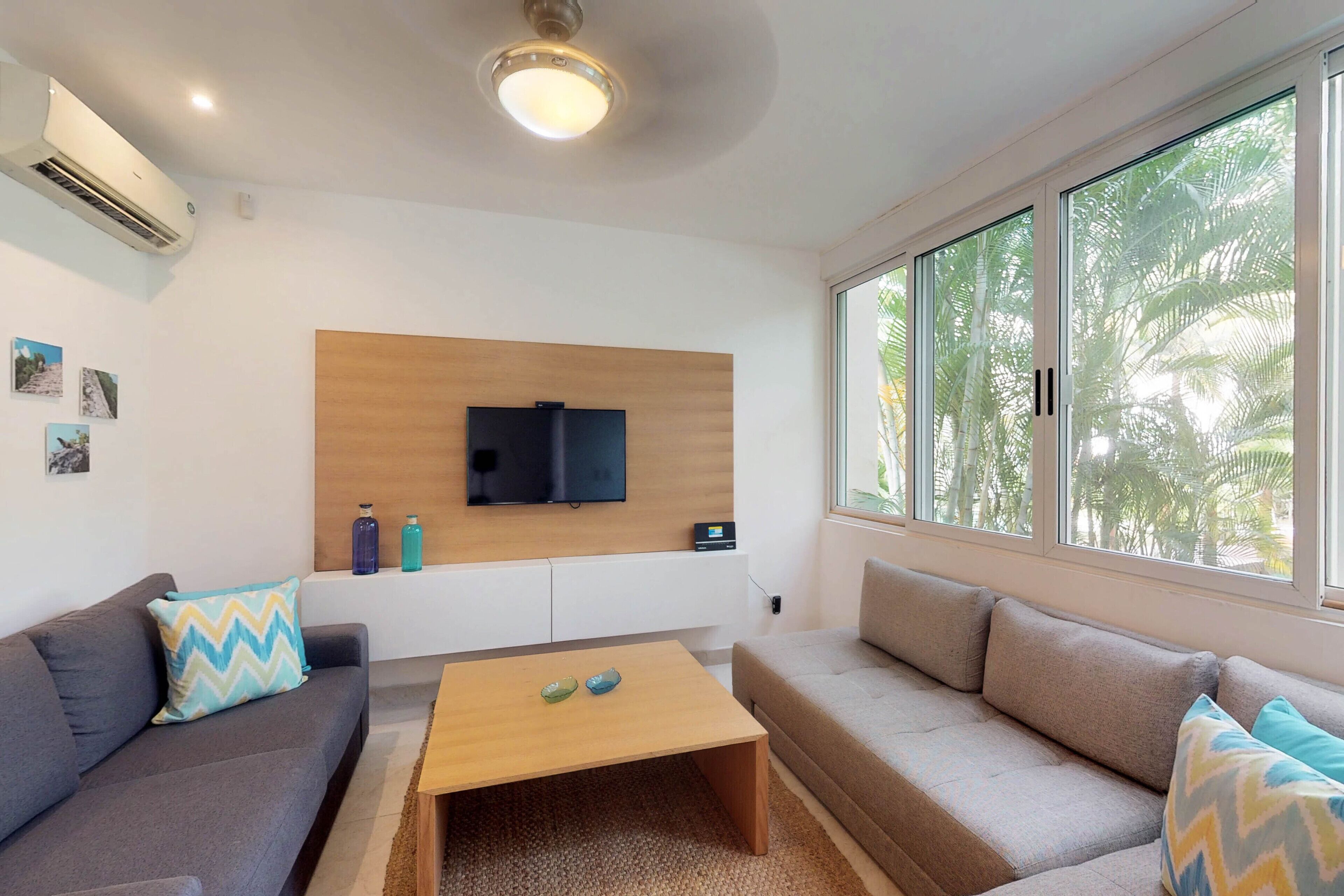 Spacious villa with balcony, patio, strong WiFi, partial AC, pool & gym