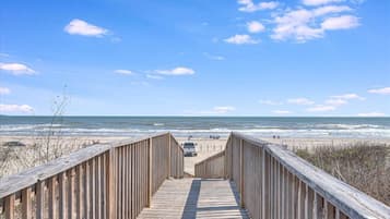 On the beach, sun-loungers, beach towels