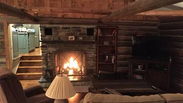 Smart TV, fireplace, DVD player, books