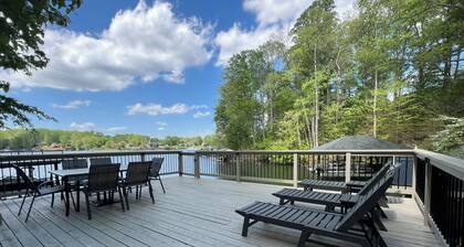 5 Bed 4 Bath Waterfront Home on Deep Water Cove Ideally located by car or boat!