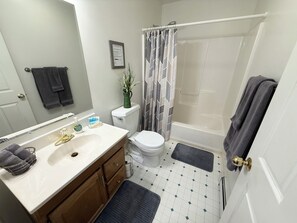 Hair dryer, towels, soap, shampoo