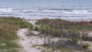 A beach path with a wooden fence and sand dunes. - Oceanfront Duplex - Sleeps 10 - Great Price!! 3 B/R, 2.5 bath, outdoor shower (Atlantic Beach)