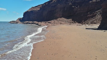 En la playa, toallas de playa