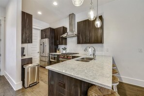 Fridge, microwave, oven, stovetop - Relax In Our Coastal Retreat w/ Elevator, Balcony, Community Pools, & Beach Tram (Panama City Beach)