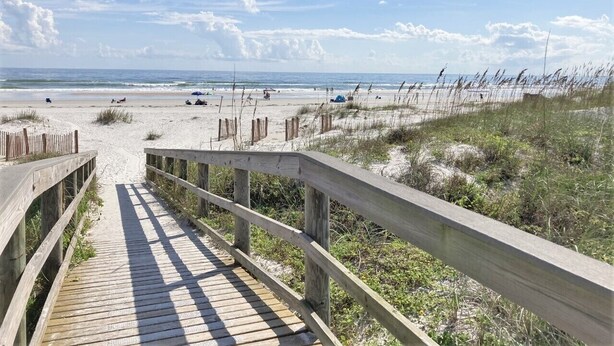 A wooden boardwalk leading to a beach with sand dunes and a clear sky. - LOW RATES - Very Clean, Building G, 2/2 Pool, Beach, Tennis, Wifi Top floor (Saint Augustine)