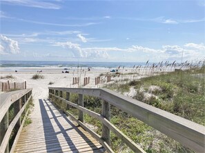 A wooden boardwalk leading to a beach with sand dunes and a clear sky. - LOW RATES - Very Clean, Building G, 2/2 Pool, Beach, Tennis, Wifi Top floor (Saint Augustine)