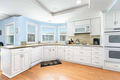 Upstairs Ocean View Condo | Steps to Beach | Multiple Patios! | Cool, Coastal Interior | Sleeps 10!