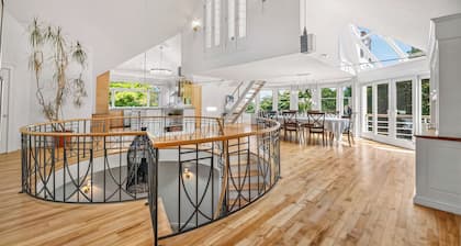 Luxury oceanfront estate with speakeasy, rooftop deck, tennis court & private beach.