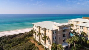 A beachfront hotel with multiple balconies, a pool, and a view of the ocean. - Seabiscuit -Scenic 30A, Phenomenal Gulf Front Condo w/Spectacular Views! (Rosemary Beach)