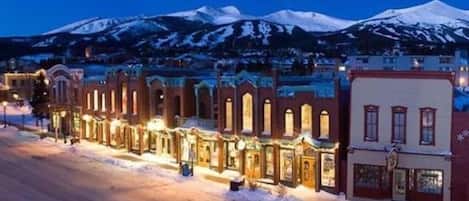 Stroll through historic streets lined with traditional buildings featuring arched windows and ornate facades.