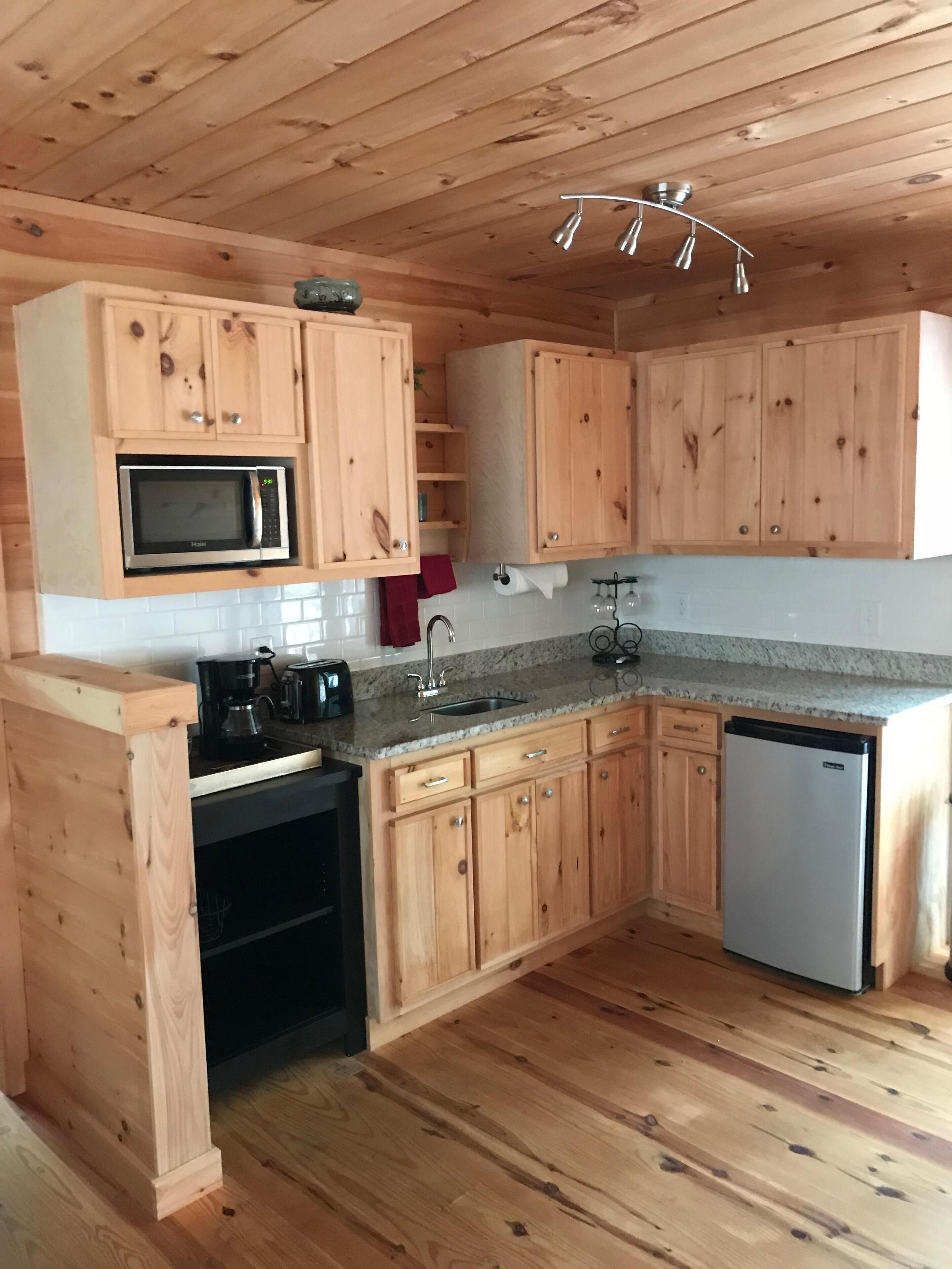 Wooded setting, upscale natural wood interior, approx 4 miles from town square