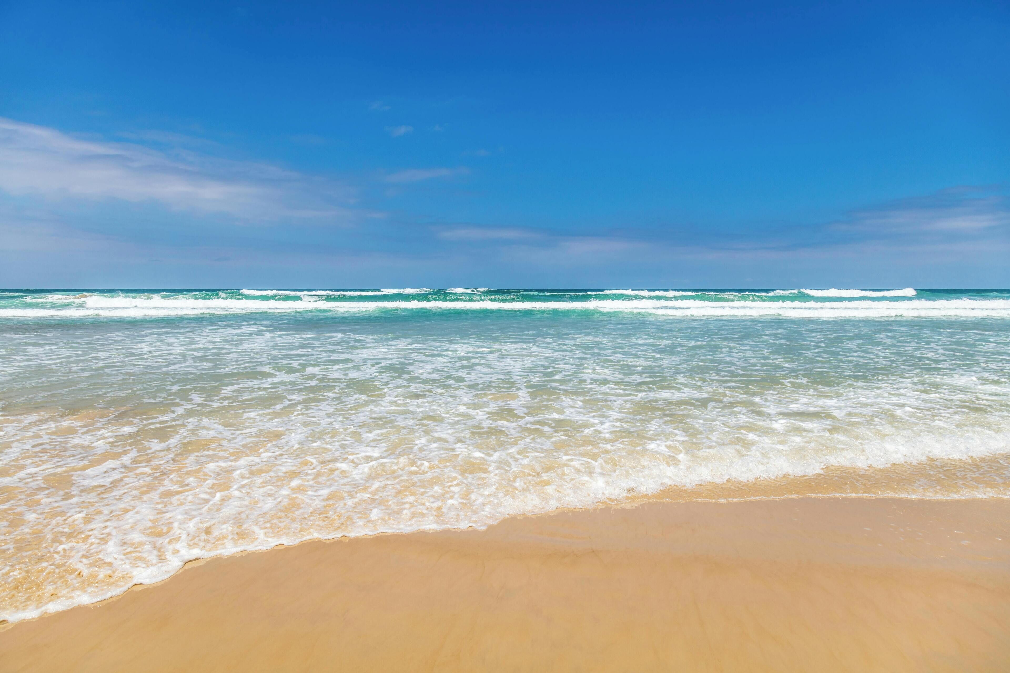 On the beach, sun loungers, beach towels