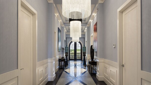 A hallway with a chandelier, white doors, and a marble floor. - Waterfront Home-Bowling Alley, Cinema, Sauna, Outdoor Grilling, Pool w/ Slide  (Four Corners)