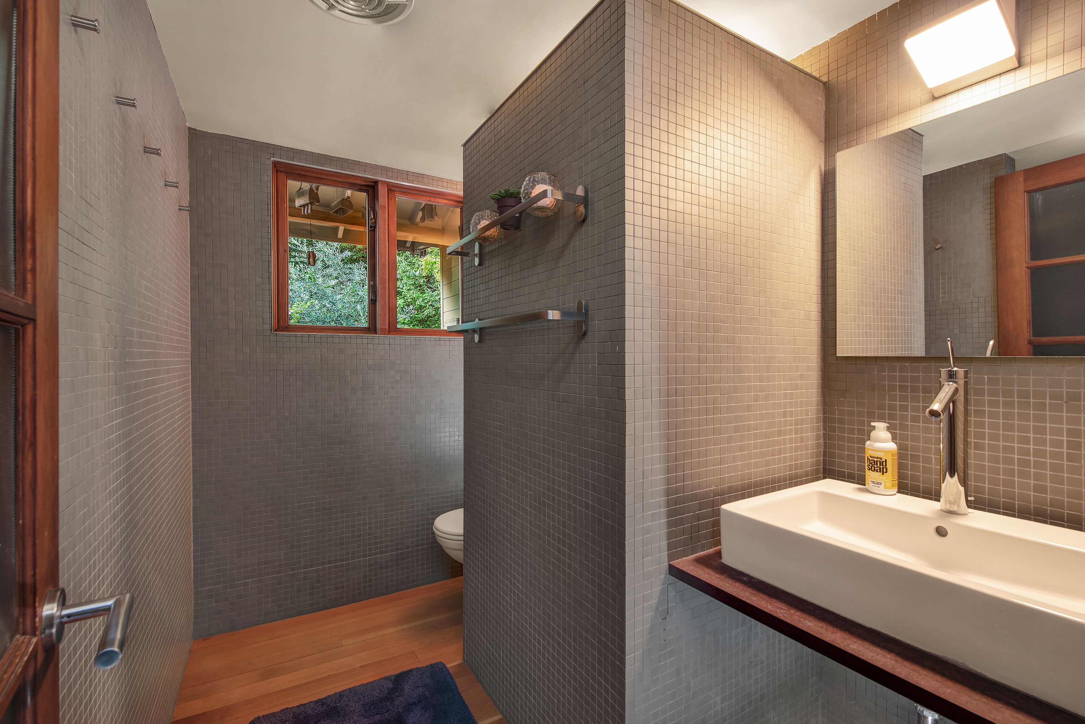 Gorgeous lush private RIVERFRONT modern cabin with its own beach.