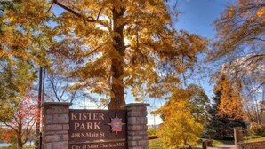 A park sign at Kister Park, 408 S. Main St., City of Saint Charles, MO, with park hours from dawn to dusk. - 1870's Luxury Guest Cottage, Historic Downtown St. Charles, Mo. (St. Charles)