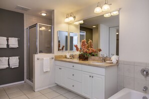 Combined shower/tub, hair dryer, towels, soap