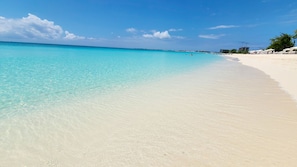On the beach, sun loungers, beach towels