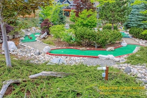 Play a round of golf amidst lush gardens and unique obstacles.