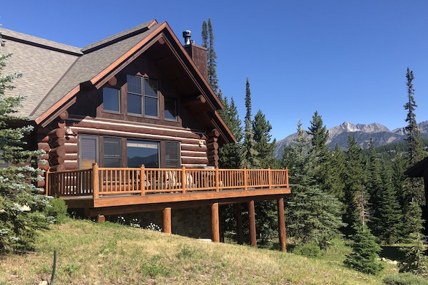 Sumer view of cabin, deck, and view