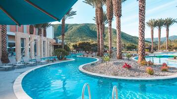 3 outdoor pools, cabanas (surcharge), pool umbrellas
