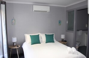 2 habitaciones, tabla de planchar con plancha, cuna de viaje y wifi 
