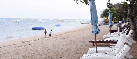 On the beach, beach towels