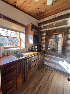 Fridge, microwave, coffee/tea maker, toaster