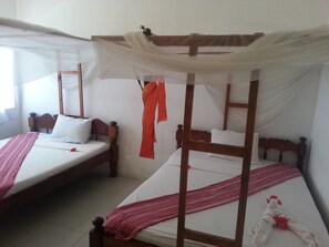 Bungalow, Garden View, Beachfront | Desk, bed sheets