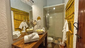 Shower, hair dryer, towels, soap