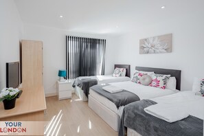 2 bedrooms, desk, iron/ironing board, travel cot
