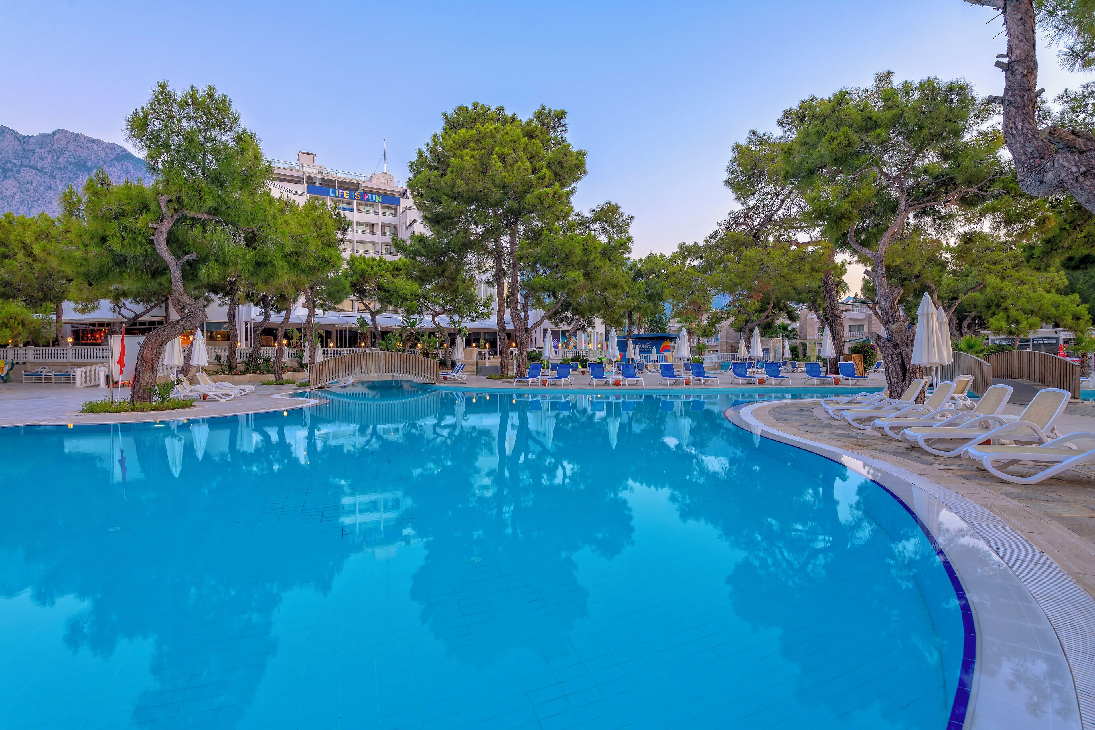 Seasonal outdoor pool, pool umbrellas, sun loungers