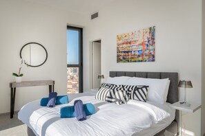 2 bedrooms, premium bedding, blackout curtains, iron/ironing board