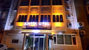 A multi-story building with a sign reading "ANTIKOTEL" at the entrance. - Ankara Antik Otel (Ankara)