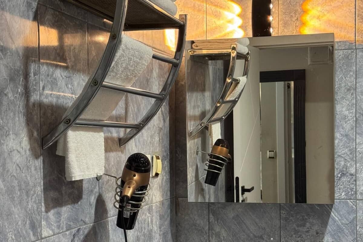 Shower, free toiletries, hair dryer, slippers