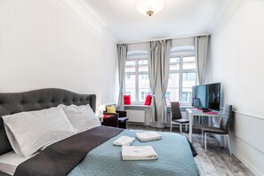 Desk, iron/ironing board, free WiFi, bed sheets