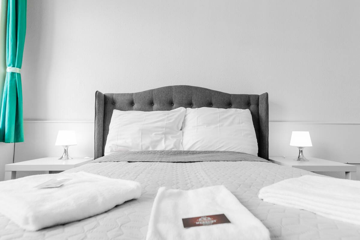 Economy Double Room | Desk, iron/ironing board (on request), WiFi (free), bed sheets