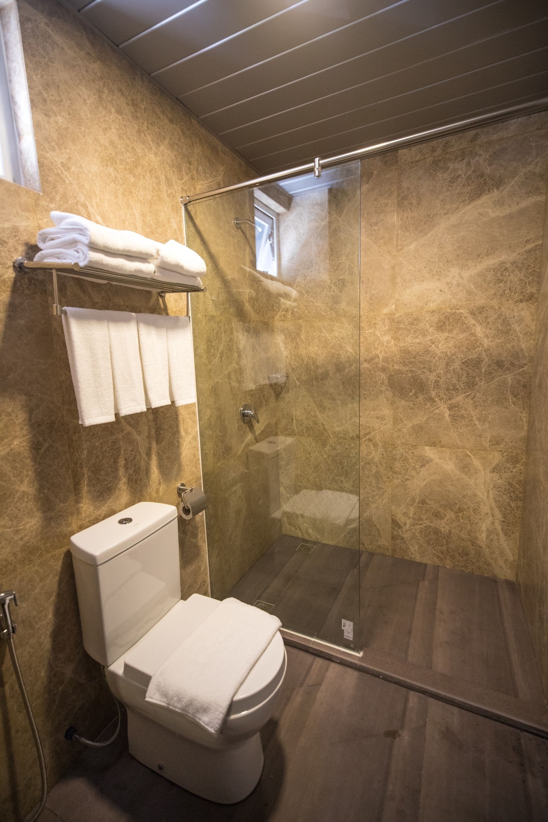 family room | bathroom | shower, free toiletries, hair dryer, slippers