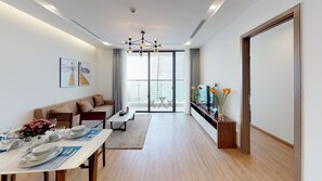 City Apartment, 2 Bedrooms, Non Smoking | Living room | 49-inch flat-screen TV with cable channels, TV - Luxury Apartment in Vinhomes Metropolis (Hanoi)