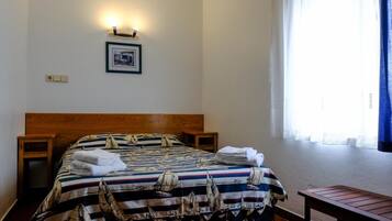 Desk, free WiFi, bed sheets