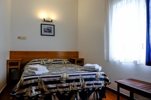 Desk, free WiFi, bed sheets