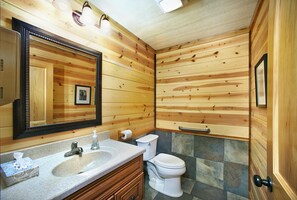 Shower, hair dryer, towels, toilet paper