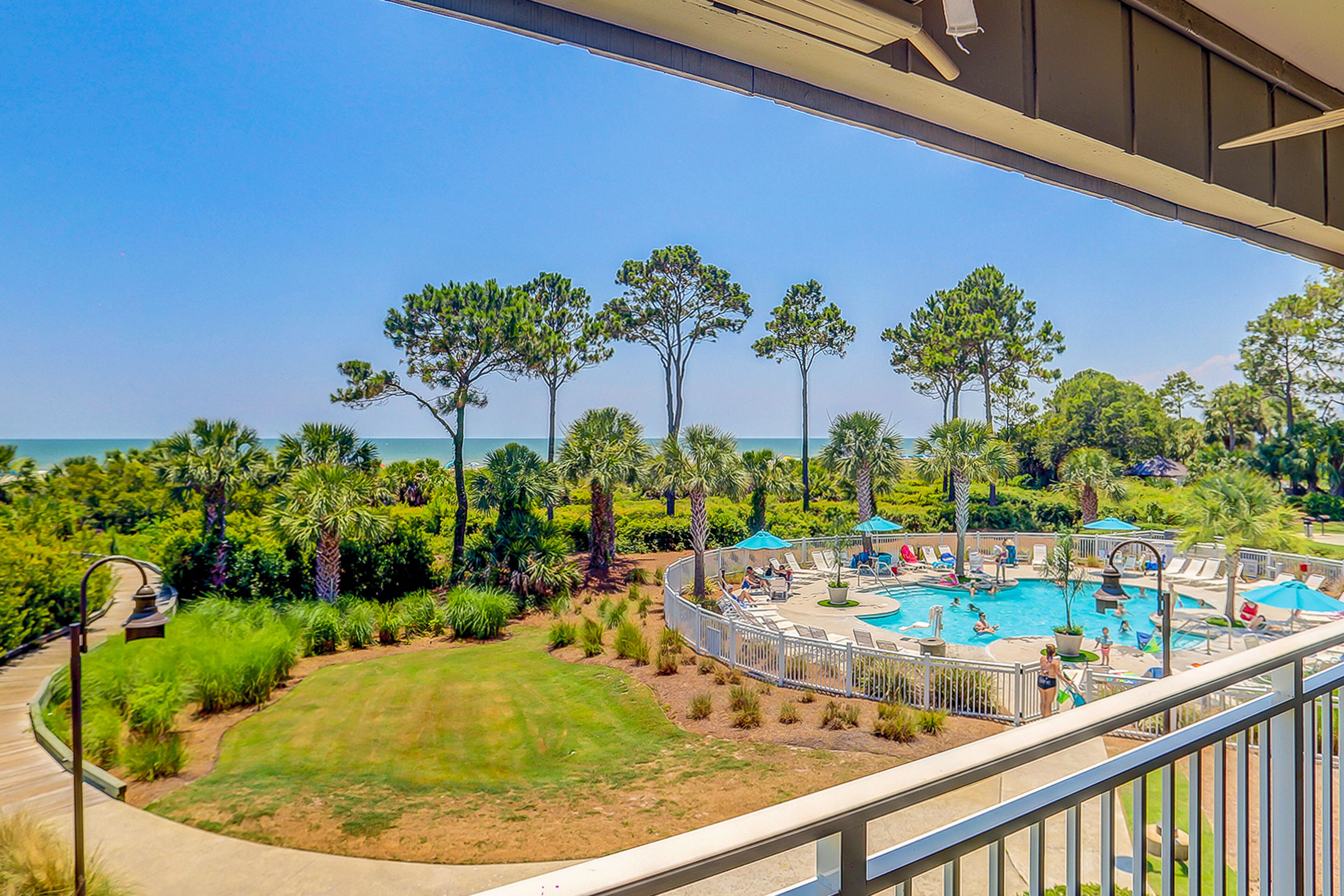 Gorgeous oceanfront condo with new kitchen & bathroom, pool view, steps to beach