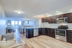 Enjoy cooking and dining in this well-equipped kitchen with a dishwasher and ample counter space.